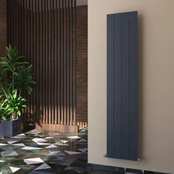 Modern vertical radiator in an interior setting with contemporary decor and patterned flooring.