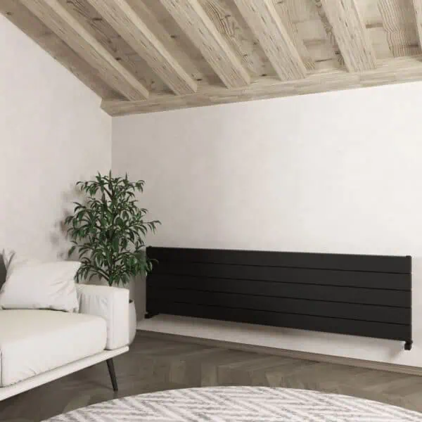 Minimalist living room with modern black radiator and wooden ceiling, cozy white sofa, and green plant for stylish interior decor.