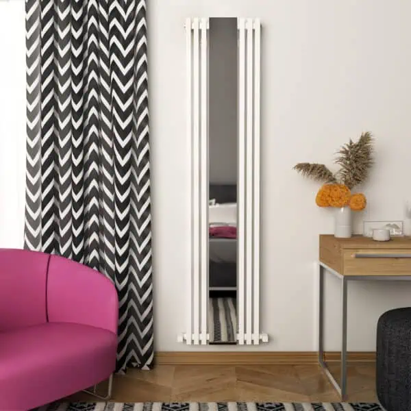 Modern vertical radiator with a mirror in a contemporary living room setup.