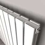 Modern white panel radiator for home heating and interior decor.