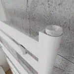 Battery-powered LED wall light with adjustable brightness for modern interior lighting.