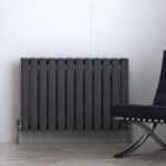 Modern black radiator with sleek design for home heating solutions.