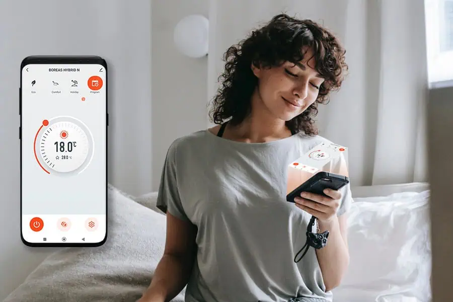 Smart home thermostat app controlling temperature remotely.