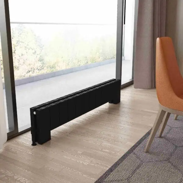 Black radiator cover for home heating, modern design.