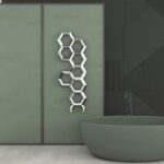 Hexagonal wall art in modern interior design, stylish decorative honeycomb sculpture.