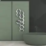 Hexagonal wall art in modern interior design, stylish decorative honeycomb sculpture.