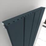Modern black radiator, sleek and slim design, ideal for home heating solutions.