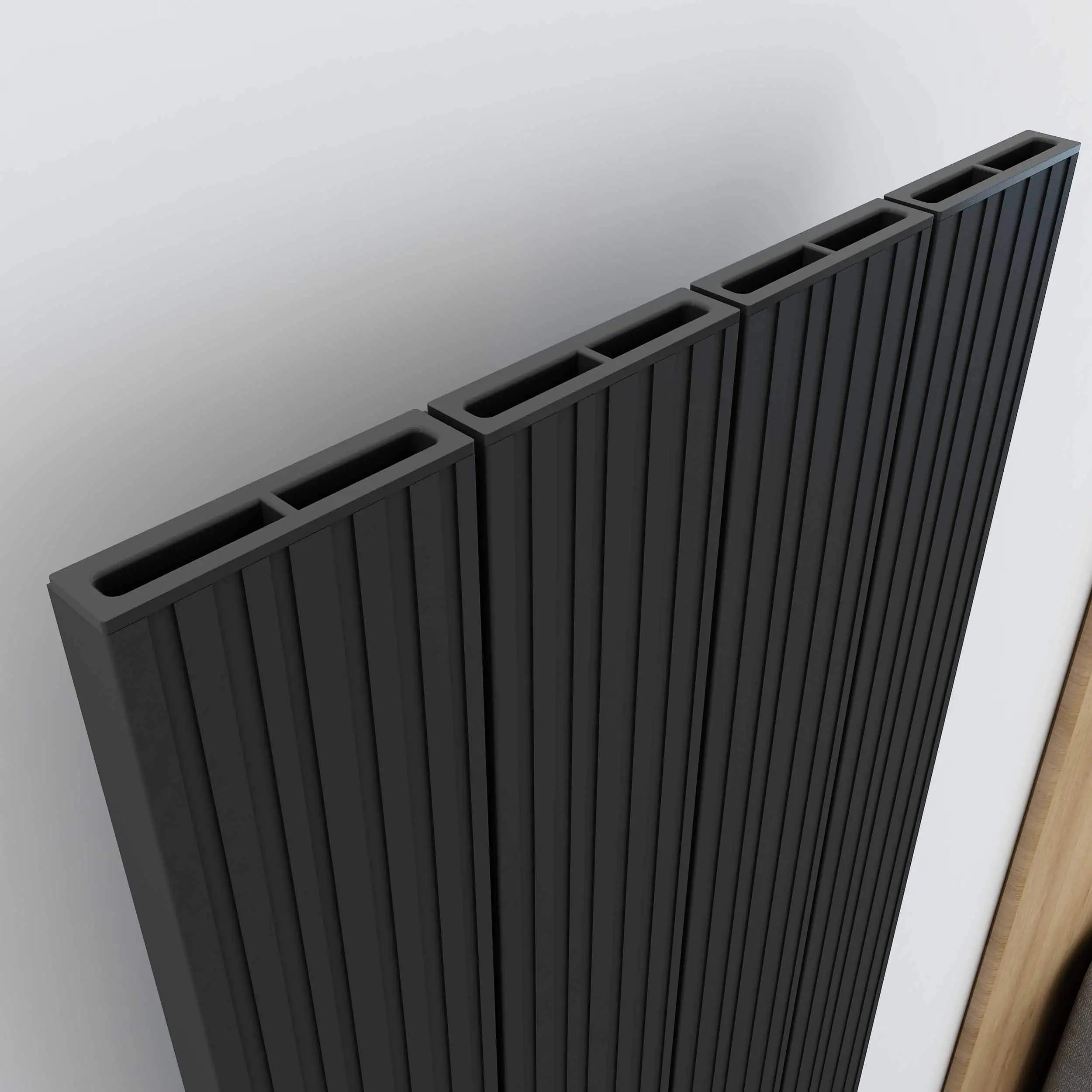 BOREAS M DETAY TXB Black aluminum radiator with vertical fins for optimal heat dissipation.