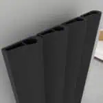 Black modern radiator for home heating installation.