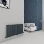 Modern heating radiator in a stylish minimalistic living room setting.