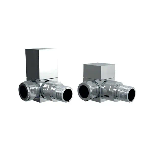 Shiny metal commercial plumbing valves with rectangular control boxes.