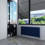 Contemporary black window blinds in a modern room with radiator and glass cabinet.