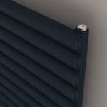 Black modern venetian radiator showcasing sleek design and efficient heating system.
