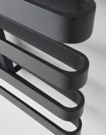 Modern black and silver heated towel rack for bathroom decor and functionality.