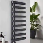 Contemporary black towel radiator in modern bathroom decor.