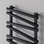 Black modern radiator wall heater for bathroom or living room, sleek and stylish design.