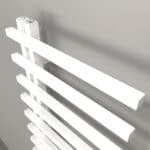 Modern white radiator panel for heating system, sleek design, efficient home heating solution.