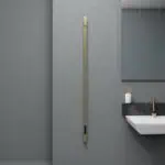 Maxim brushed brass PVD electric designer towel rail offers premium warmth, elegant finish, and long-lasting performance for modern luxury bathrooms.