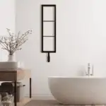 Black modern wall-mounted shelving unit in a stylish bathroom setting.