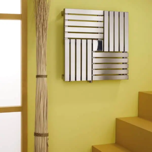 Modern wooden radiator cover with sleek silver finish, stylishly complements interior decor.